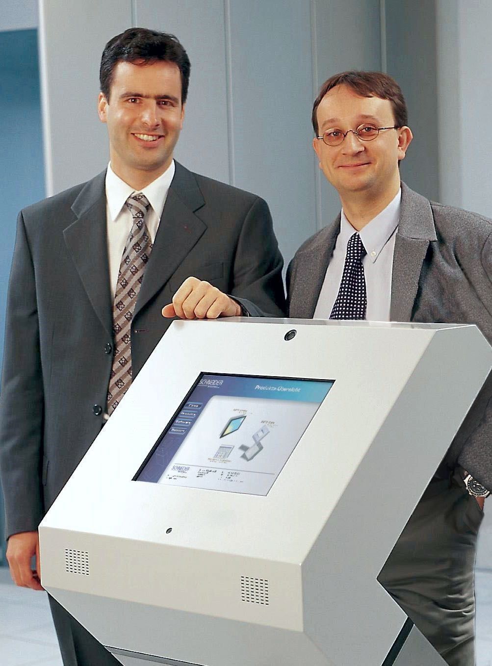 The founders in 2000 with the first own product InfoGate